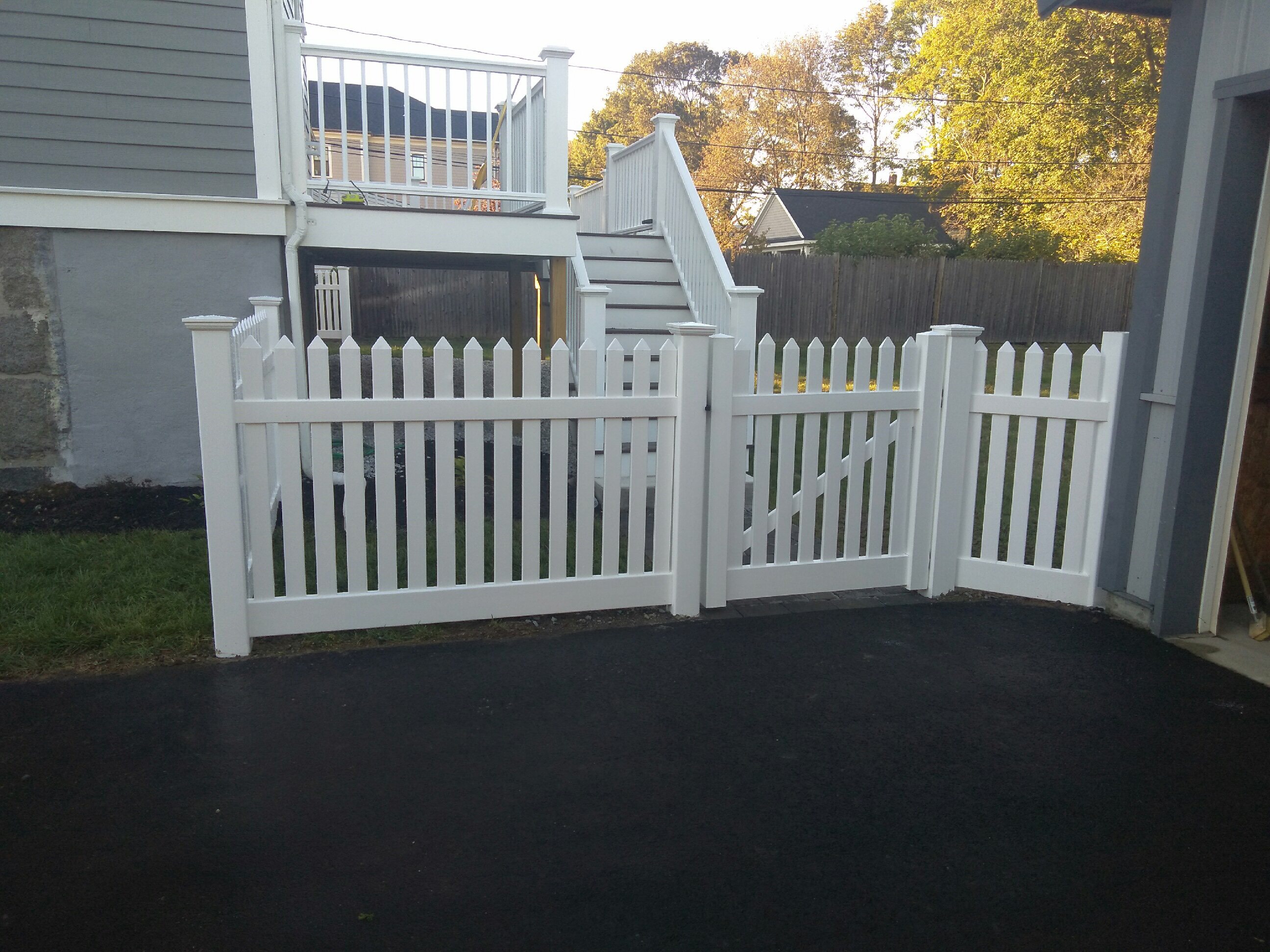 Vinyl Fence Sloped Yard